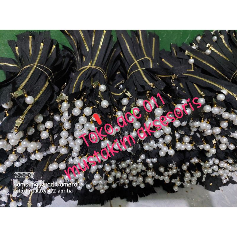 resleting mutiara - harga per 1 lusin - minimal beli 10 lusin -resleting bandul mutiara - supplier aksesoris konveksi garmen - zipper mutiara