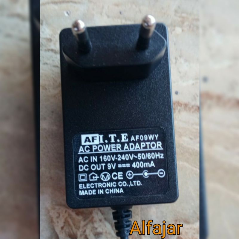 Adaptor Efek Biyang 9V 400mA Efek Regulated Negative Center
