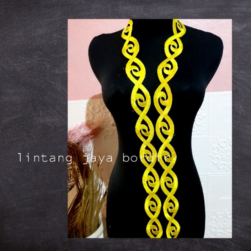 renda bordir roll aplikasi motif dayak / mata dayak