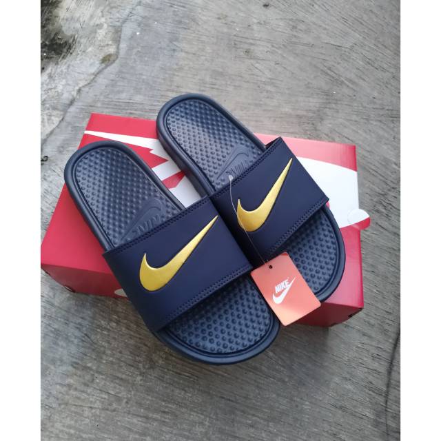 nike benassi gold swoosh