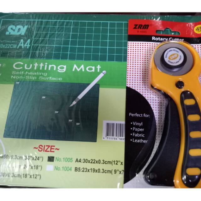 

Paket cutting mat A4 dan rotary cutter 1 set murah