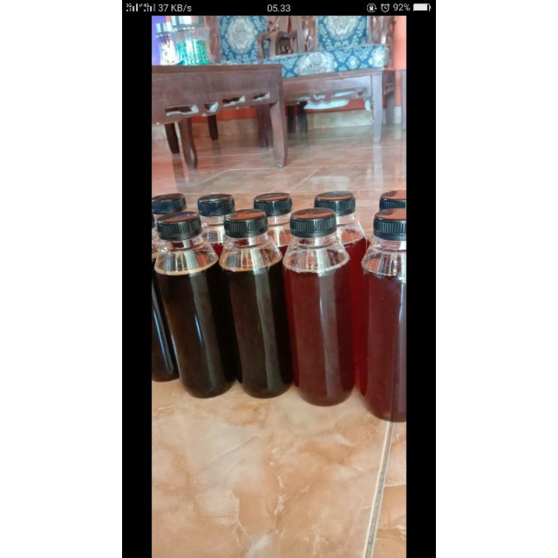 Madu Hitam Pahit Kemasan Botol Plastik