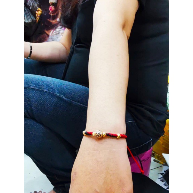 Gelang tali rajut bulat variasi lapis emas mata hitam