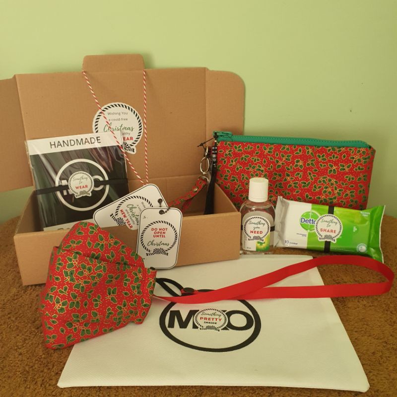 

Hadiah Natal by MKO Motif Daun Natal Merah