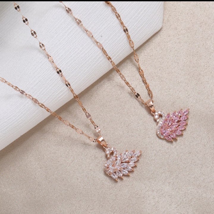 kalung titanium gold bandul mutiara lonjong