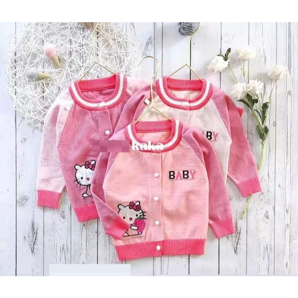 Sweater Rajut Kancing Tengah 80-110 ( Motif Random )
