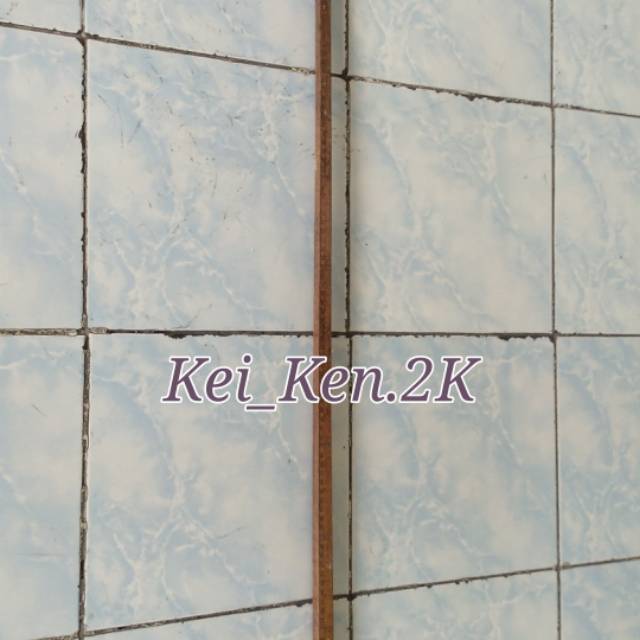 

penggaris kain kayu kuno