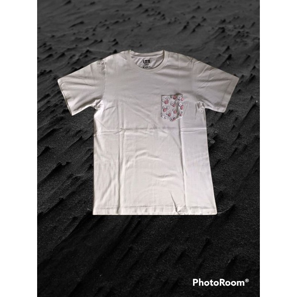 uniqlo x kaws pocket putih mata