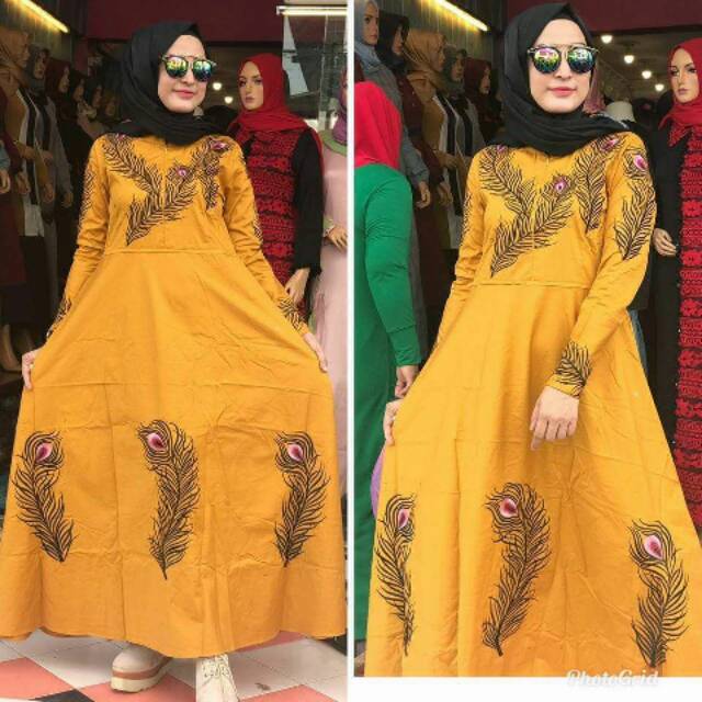 Gamis aceh motif bulu merak