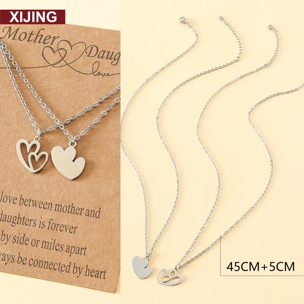 2pcs / SET Kalung Rantai Klavikula Bahan Stainless Steel Model Hati Ganda Hollow Untuk Hari Ibu