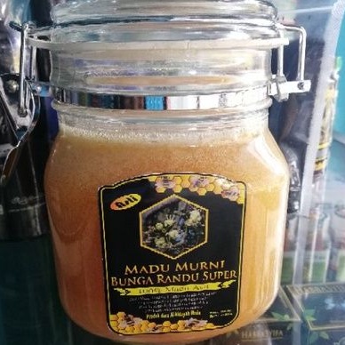 

Madu murni dan asli bunga randu, madu super 100% asli bergaransi