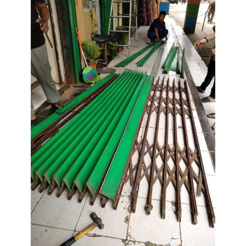 service dan pasang baru pintu rolling door dan folding gate bergaransi