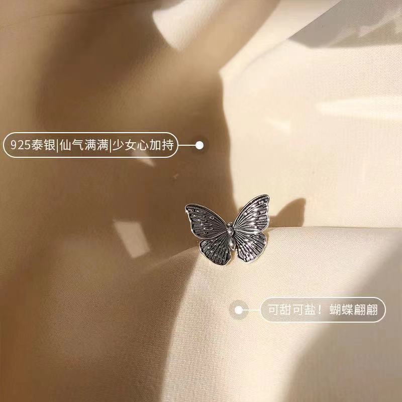 Cincin Butterfly Adjustable Bahan Stainless Steel Warna Silver Gaya Vintage Untuk Wanita
