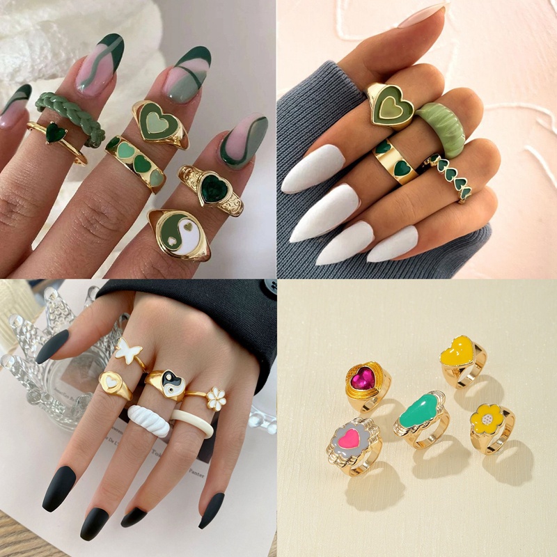 4 / 5 / 6Pcs / Set Cincin Bahan Metal Warna Pink Gaya Punk Untuk Wanita