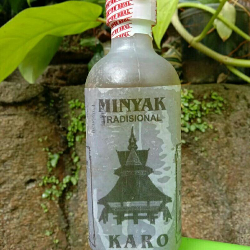 Minyak Urut Karo Cap Rumah Adat
