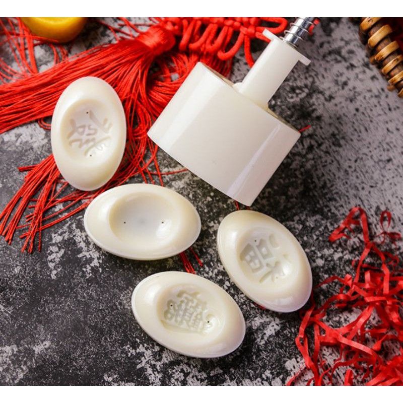 Cetakan mooncake motif yuan bao / yen pao