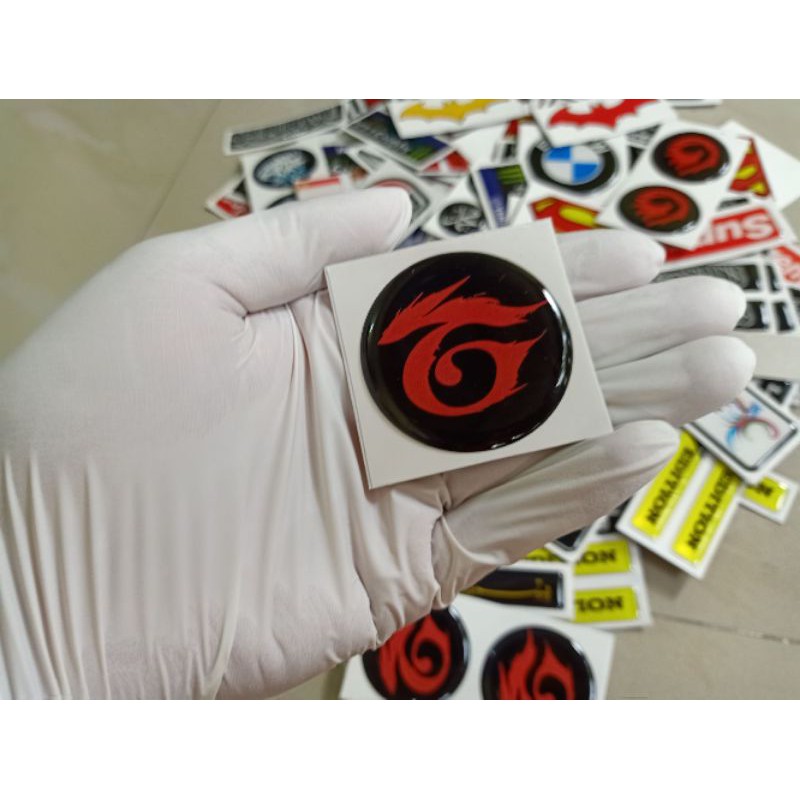 

Stiker timbul Lentur logo Garena FF