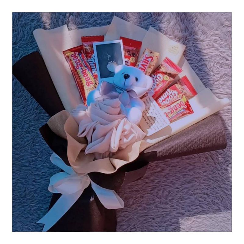 

SNACK BOUQUET BONEKA KERUDUNG SILVERQUEEN