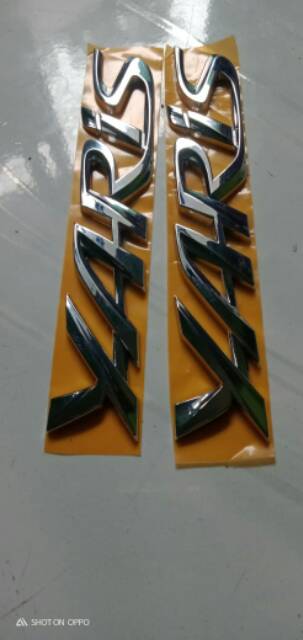 EMBLEM TULISAN YARIS chrom original