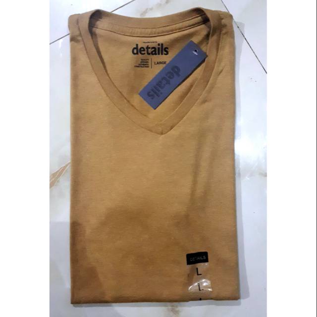 Kaos kerah V merk Details warna Kuning Kunyit