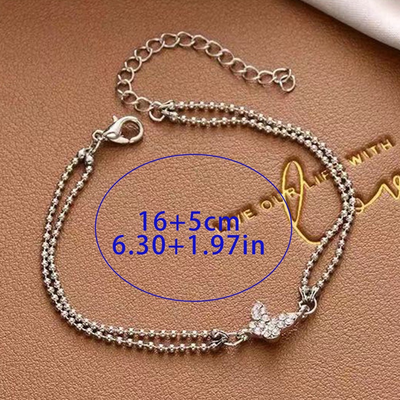 Gelang Rantai Desain Kupu-Kupu Aksen Zircon Warna Silver Anti Alergi Untuk Wanita