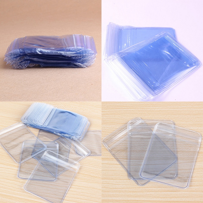 100pcs Tas Dompet Penyimpanan Koin Bahan Plastik PVC Bening