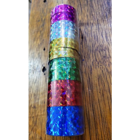 

Solatip / Isolasi / Solasi Hologram tipis (isi 12 roll)