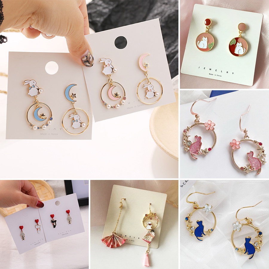 Anting Kait Gantung Asimetris Desain Hati / Kucing / Kelinci / Bulan / Bintang Hias Mutiara / Berlian Untuk Wanita