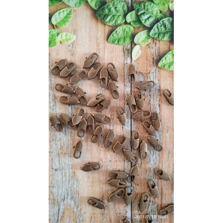 kokot udang oval pengait masker