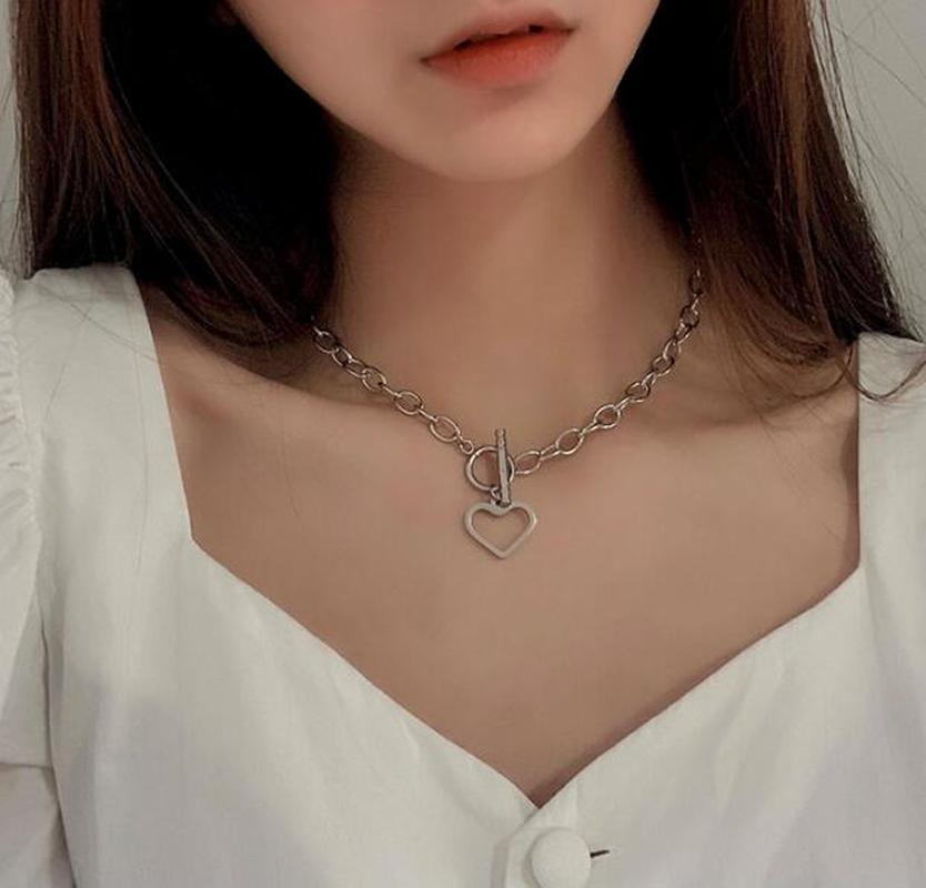 We Kalung Rantai Liontin Hati Hollow Motif Bunga Gaya Punk Untuk Wanita