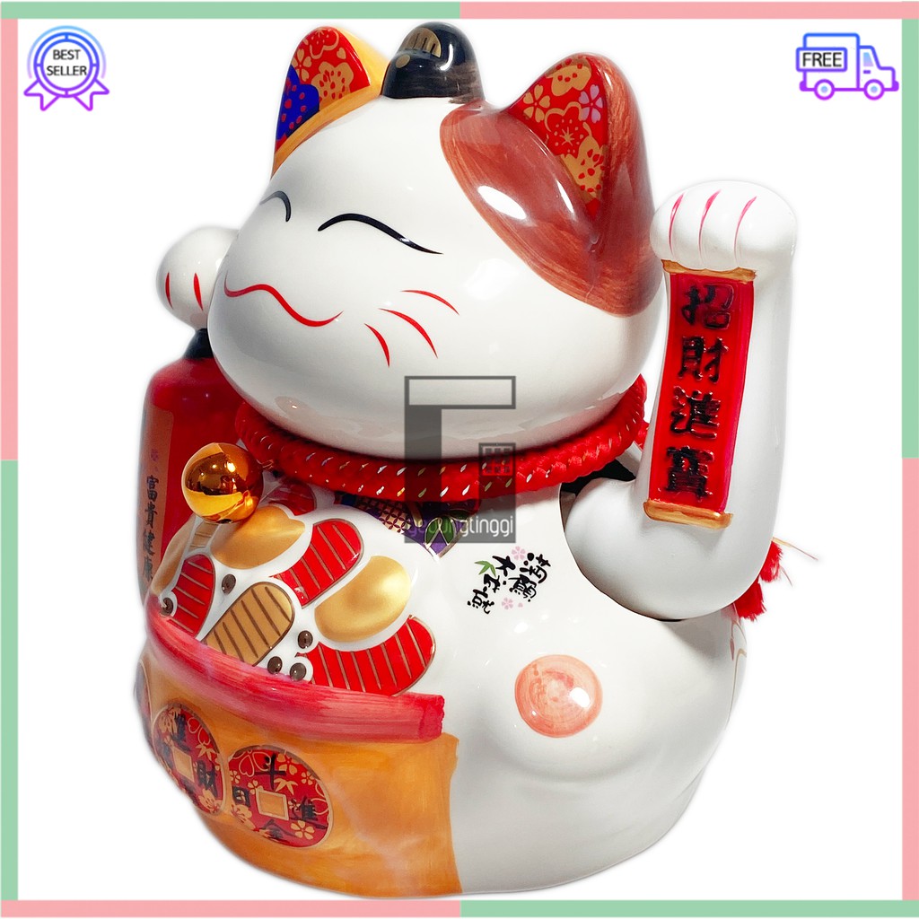 Pajangan Patung Hiasan Boneka Dekorasi Kucing Bawa Panggil Rejeki Rezeki Hoki Maneki Neko Maneko Neki ManekiNeko Lucky Cat Keberuntungan Keramik Putih Baterai Batrai Batre Listrik Tangan Goyang Gerak Meja Etalase Toko Resto Cafe Cina China Jepang Jumbo XL