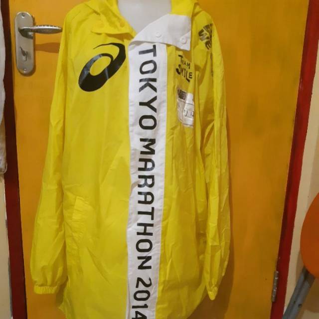 JAKET ASIC YELLOW