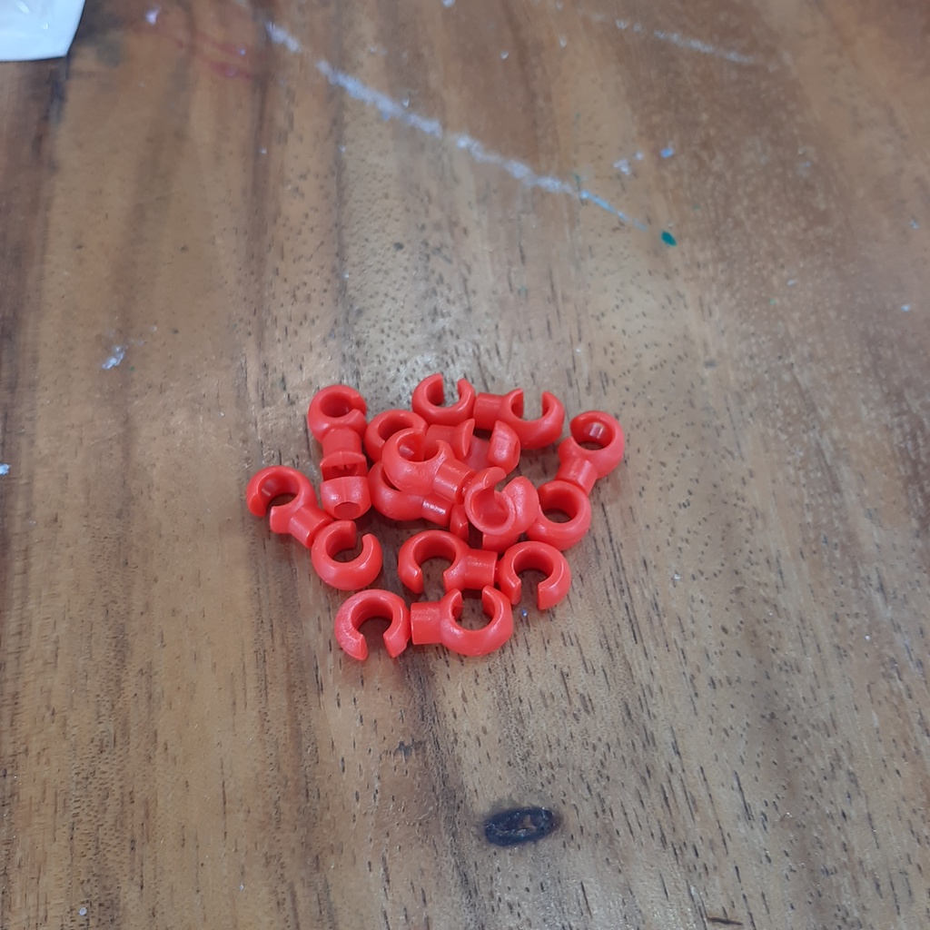 Hub pengikat kabel sepeda merah