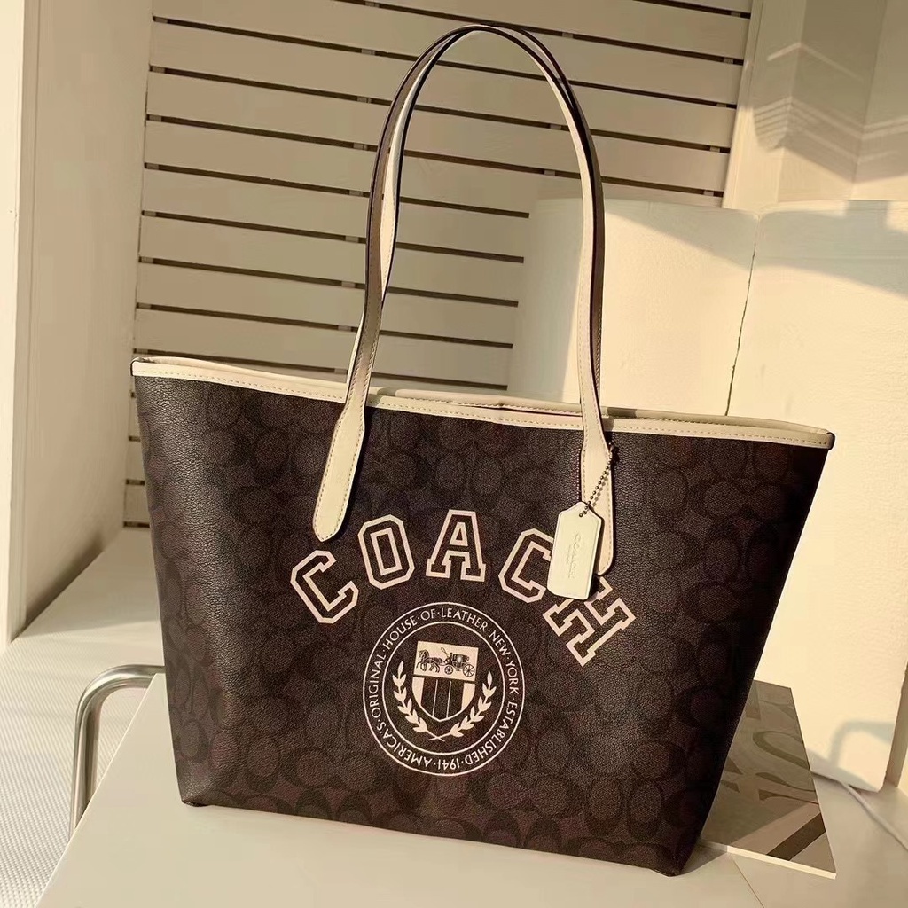 TAS totebag tote shoulder WANITA CB869 TOTE IN SIGNATURE CANVAS WITH VARSITY MOTIF 869