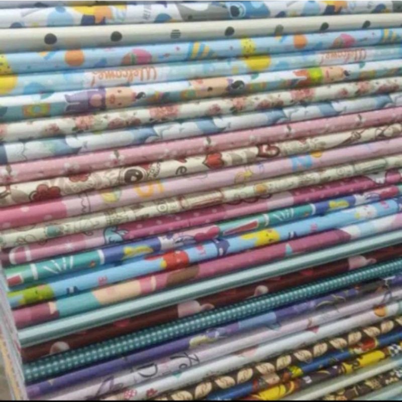 

Kertas kado aneka motif dan kartun anak