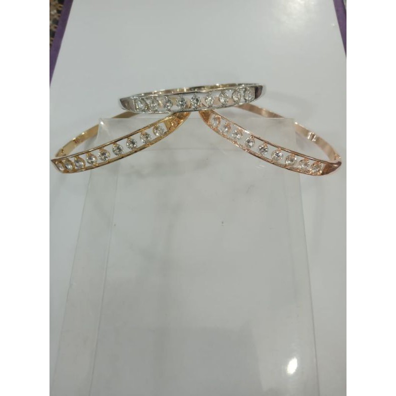 gelang tangan titanium motif mata harga satuan ada 3 varian warna