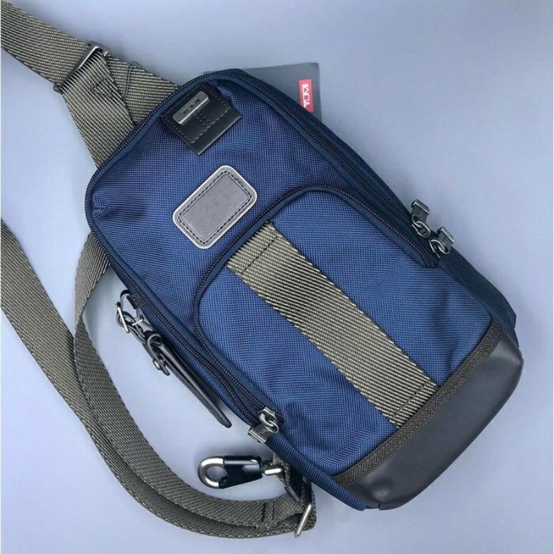 tumi fife slim sling bag-navy