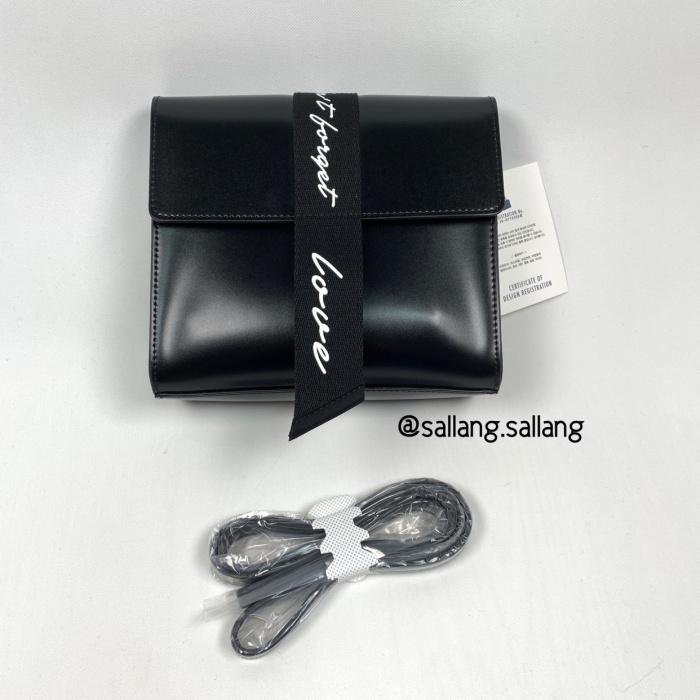 KWANI asymmetric dainty Bag