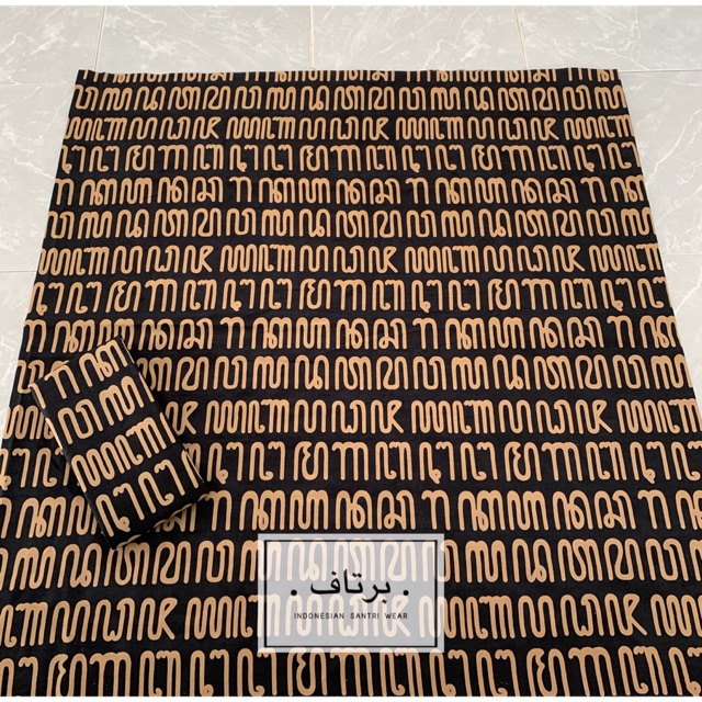 Sarung batik katun motif aksara jawa