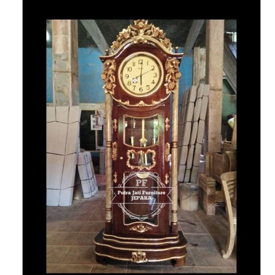 Jam hias besar ukir kayu jati Jepara