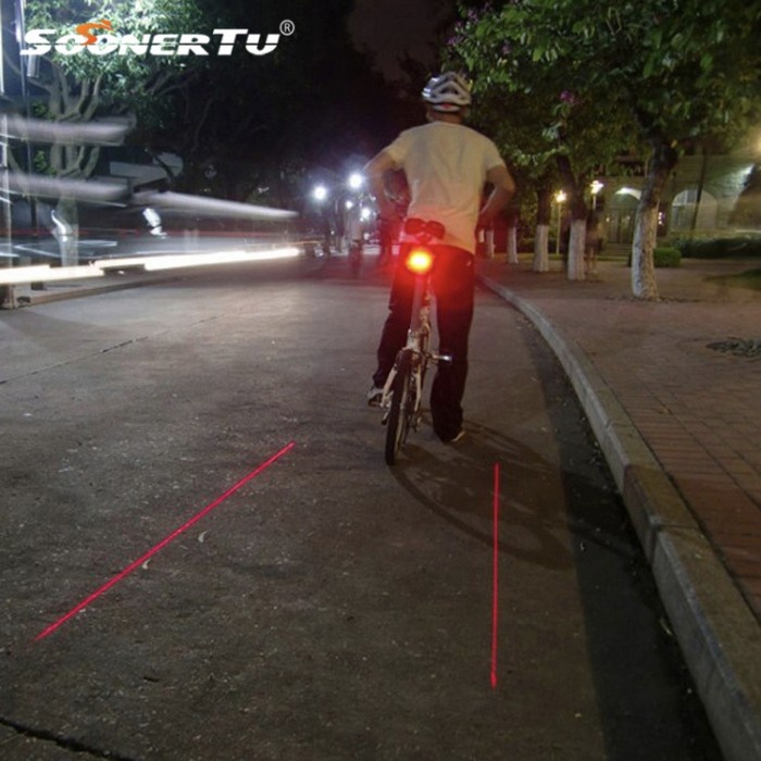 Lampu belakang sepeda dengan garis laser pengaman