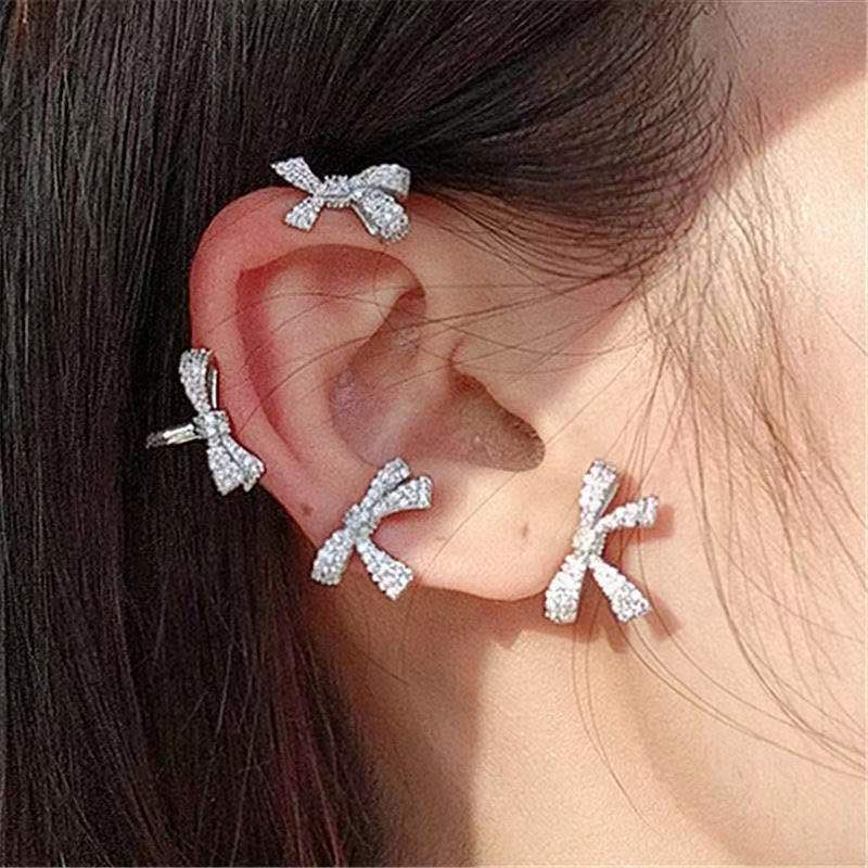 Anting Tusuk Gantung Bahan Metal Desain Pita Hias Zircon Gaya Korea Untuk Wanita