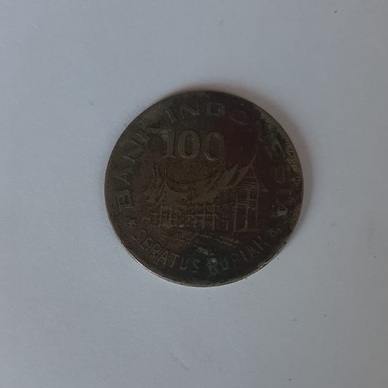 Koin 100 rupiah Wayang