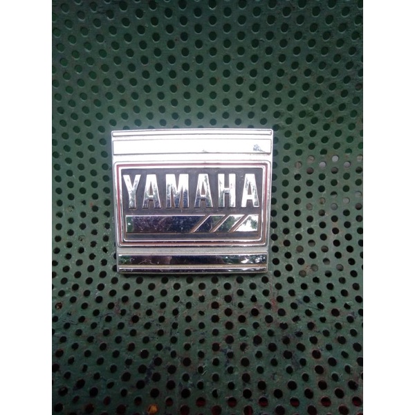 emblem panel dada depan yamaha alfa