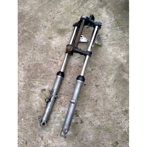 Skok shockbreaker shok depan gl 100 cepek set t atas bawah original