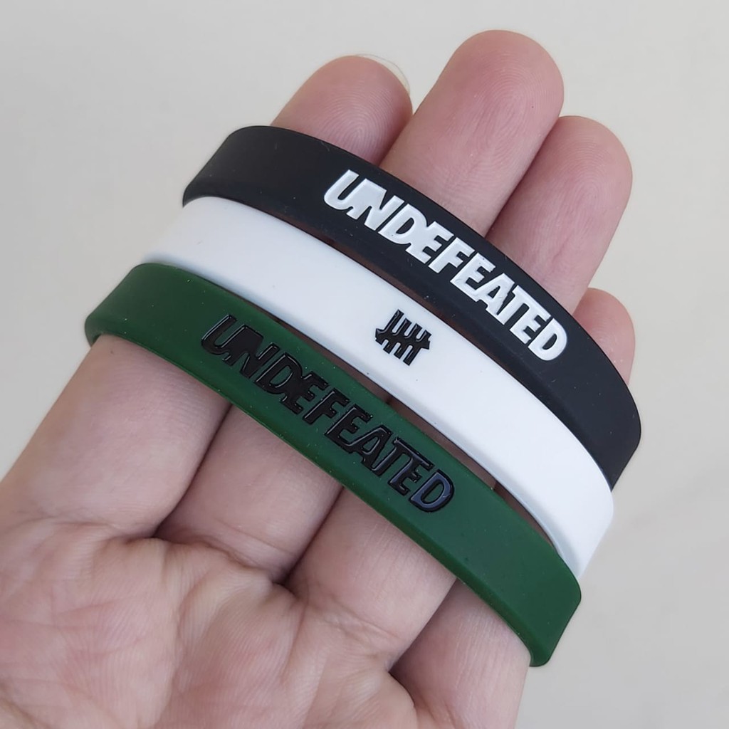 Gelang Pria Rubber / Wristband - UNDEFEATED - Aksesoris Fashion Hype [ Gratis Ongkir / Cod ]