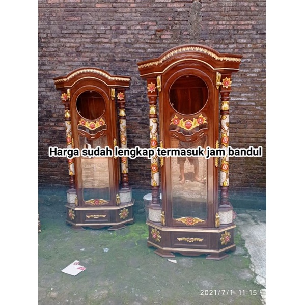 almari jam hias mawar kayu jati - lemari jam bandul rahwana kayu murah