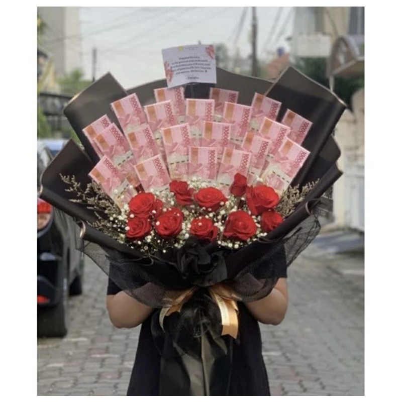 bucket uang pecahan 100ribu dan 50 ribu