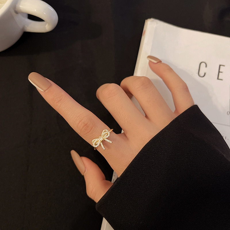 Cincin Jari Telunjuk Adjustable Desain Pita Full Berlian Imitasi Untuk Wanita