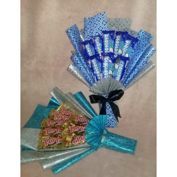 

BUKET JAJAN/BUKET HIJAB/BUKET CUSTOM/HADIAH WISUDA/ULTAH/KADO ULTAH/ANNIVERSARY